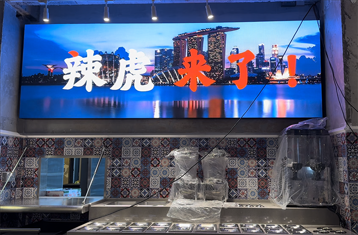 Enhancing the Dining Experience: Singapore Spicy Tiger Hot Pot Installs Tecnon P2 Series COB LED Video Screen - Showcase - 1